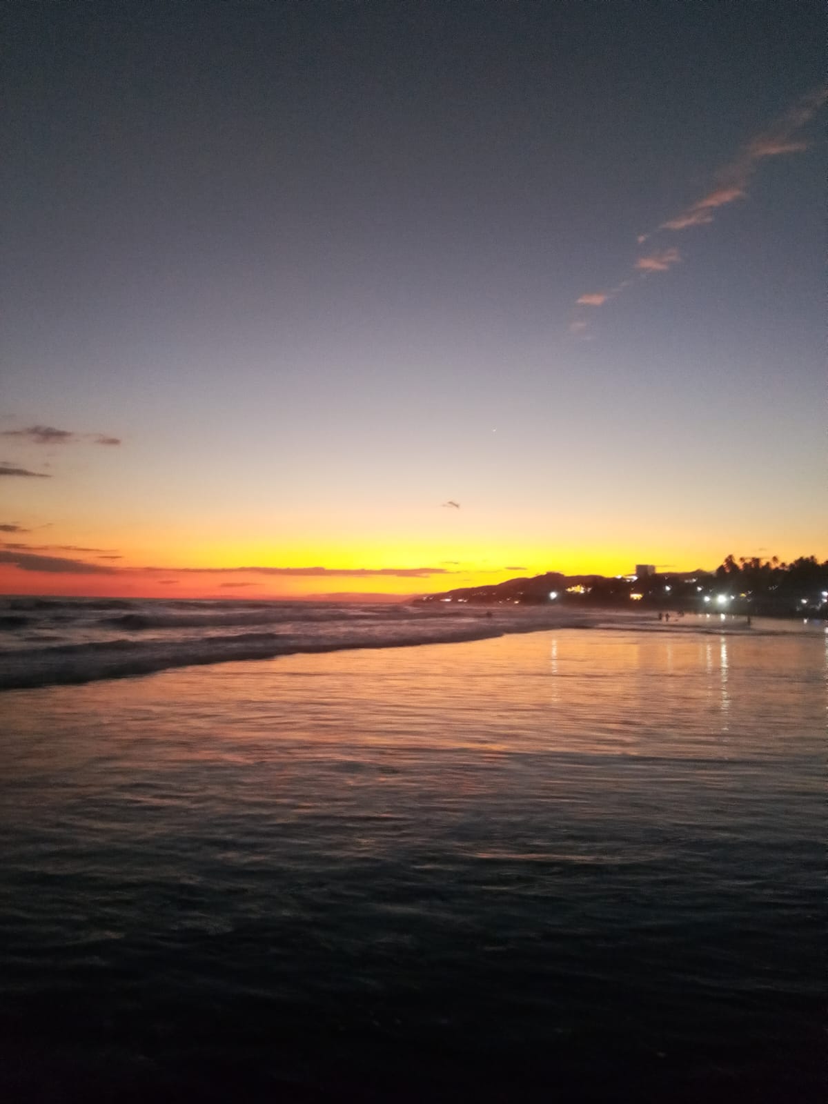 Golden Pacific sunset reflecting on the Salvadoran shore