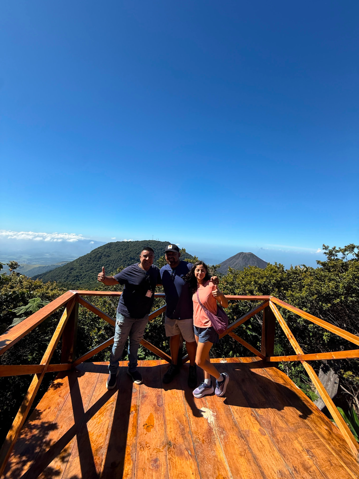 VIP Tours El Salvador guide with two guests at a volcano viewpoint