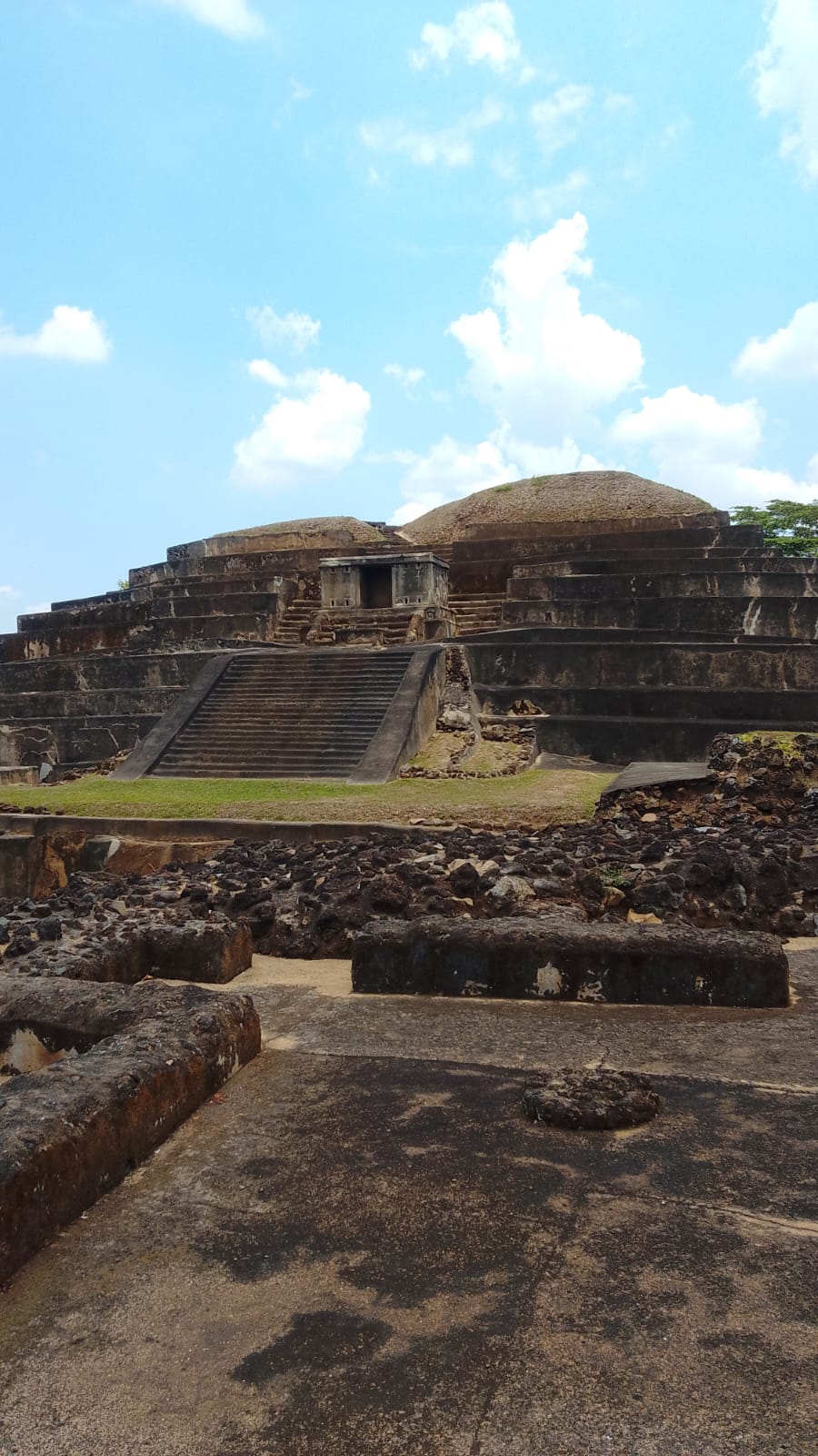 Tazumal Mayan pyramid under a bright blue sky